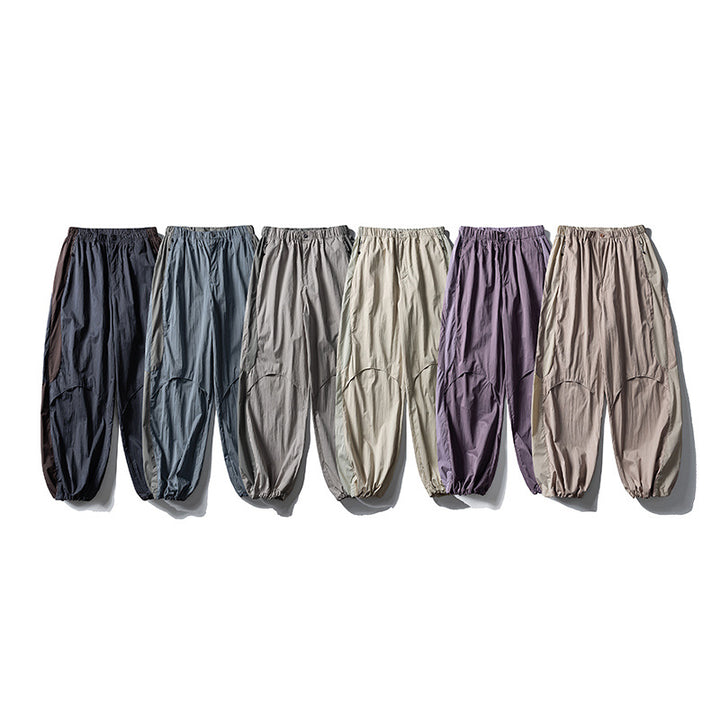 Herren Weite technische Nylon-Cargohose mit elastischem Bund und Paneel-Details Echoarchiv