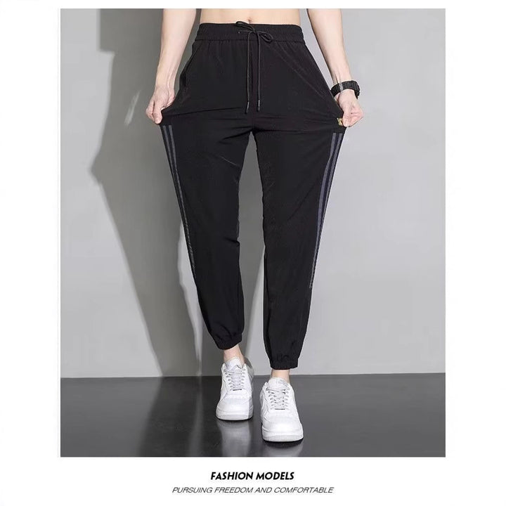 Damen Sportliche Trainingshose mit seitlichen Streifen Echoarchiv