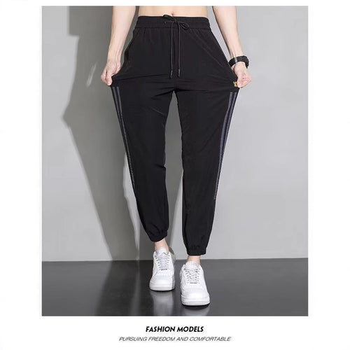 Damen Sportliche Trainingshose mit seitlichen Streifen Echoarchiv