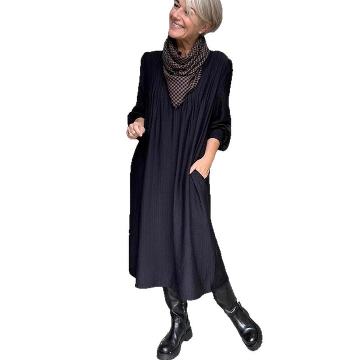 Damen nan lockeres Midikleid mit feiner Plissee-Optik, Stehkragen, kurzer Knopfleiste, gesmokten Manschetten und Eingrifftaschen Echo Archiv