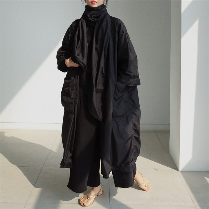 Damen Longline-Parka im leichten Windbreaker-Stil mit innenliegendem Futter, Tunnelzug und Pattentaschen – Célinea