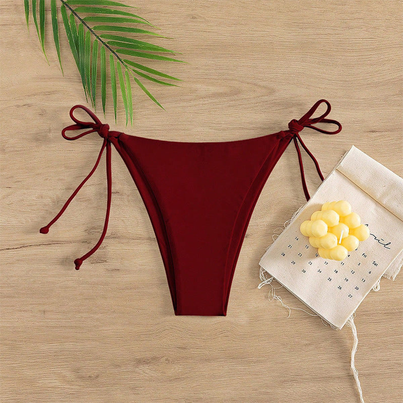 Damen Bikinislip mit verstellbaren Seitenbändern und hohem Beinausschnitt Echo Archiv