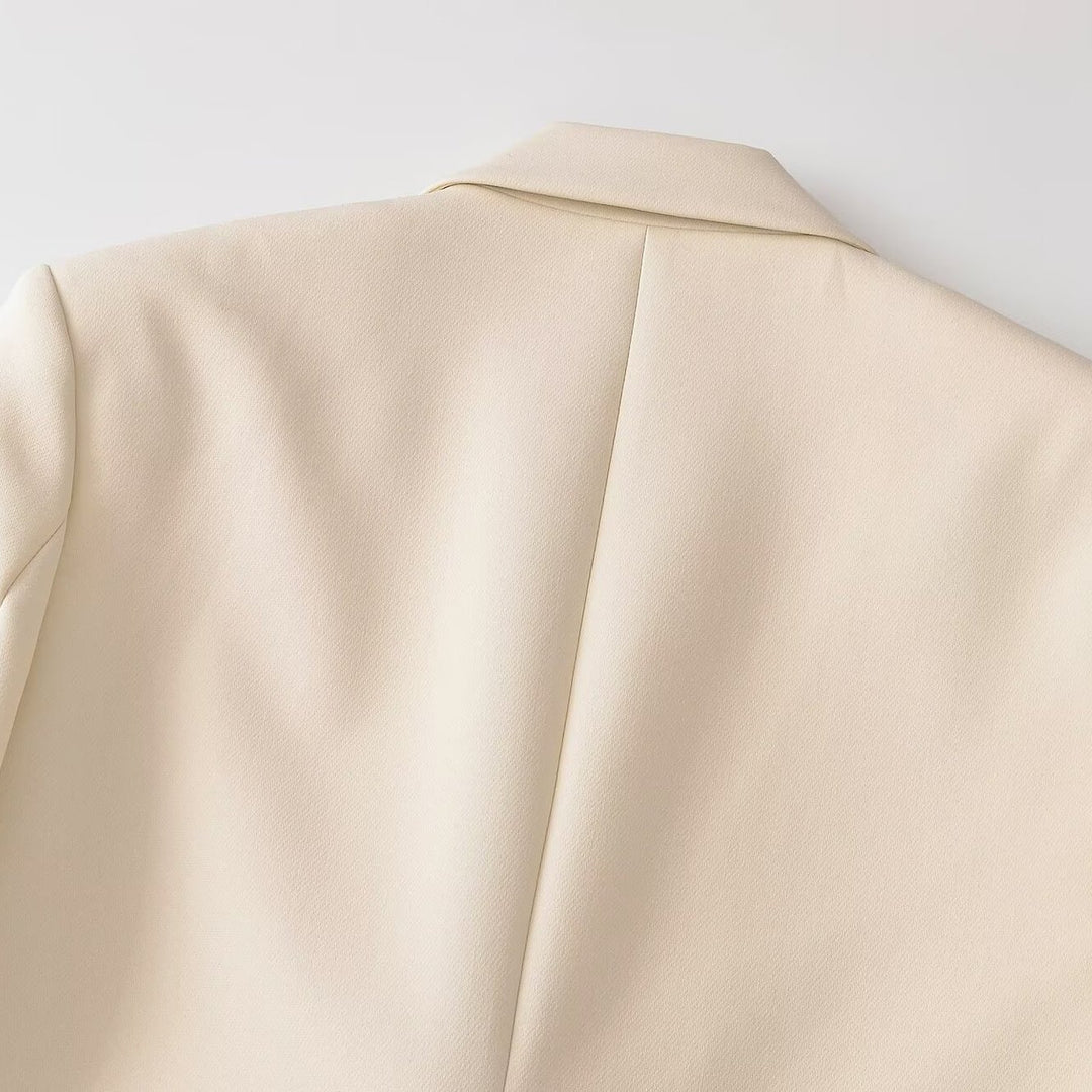 Damen Doppelreihiger Longblazer mit Reverskragen, tailliertem Schnitt und Pattentaschen Echoarchiv