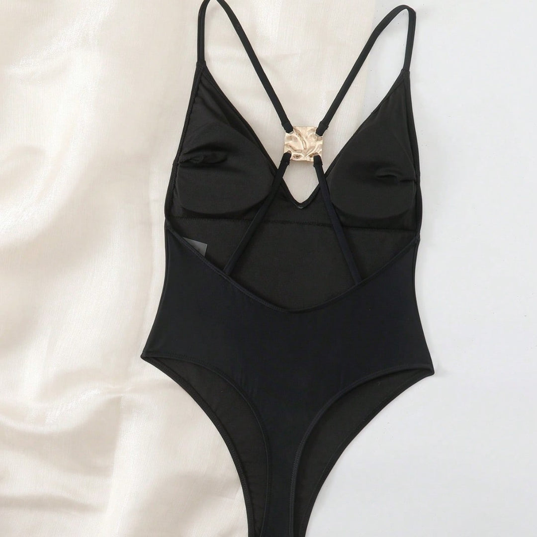 Damen eleganter Badeanzug mit goldenen Akzenten Echo Archiv