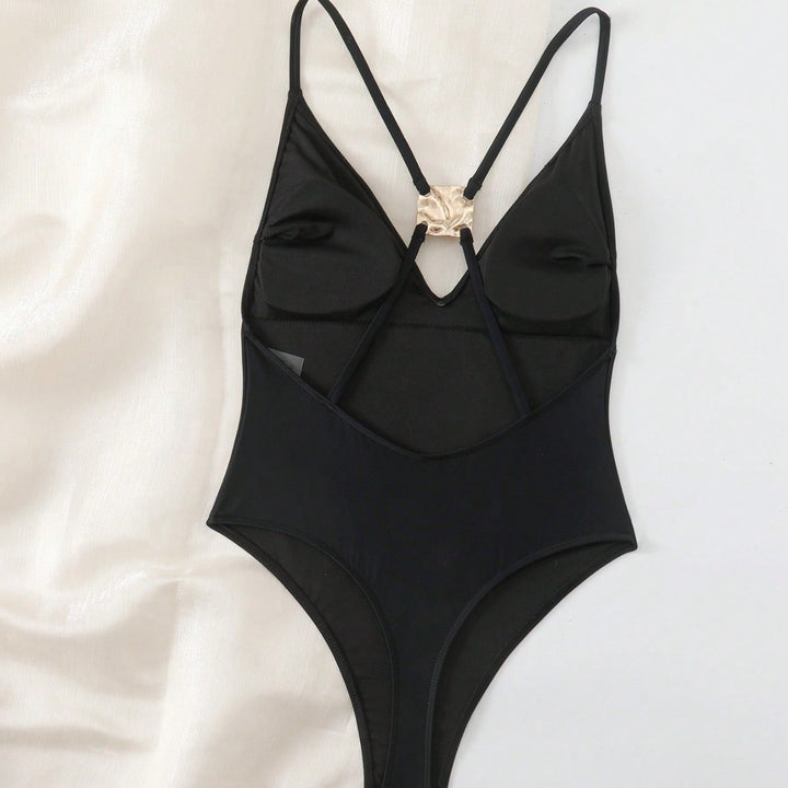 Damen eleganter Badeanzug mit goldenen Akzenten Echo Archiv