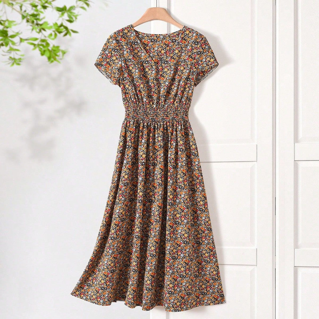 Damen Sommerliches Midikleid mit elastischem Bund und floralen Mustern Echo Archiv