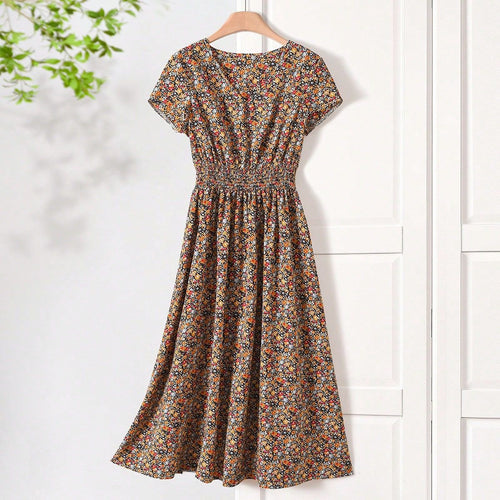 Damen Sommerliches Midikleid mit elastischem Bund und floralen Mustern Echo Archiv