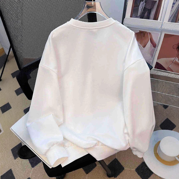 Damen nan lässiges Oversize-Sweatshirt mit gestickten Stern-Applikationen in Jeans-Optik und geripptem Saum Echo Archiv