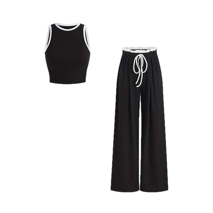 Damen stylishes Sport-Set mit hoch taillierter Weitbein-Hose und sportlichem Bustier Echo Archiv