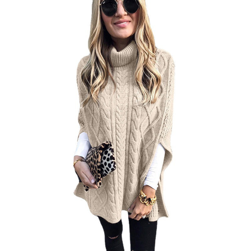 Damen nan kastiger Strickponcho mit hohem Rollkragen, Zopfstruktur und seitlichen Schlitzen Echo Archiv