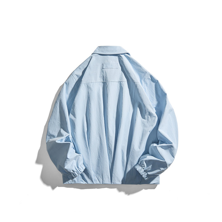 Unisex Leichte Hemdjacke im Boxy-Schnitt mit Holzknopfleiste und elastischen Bündchen Echoarchiv