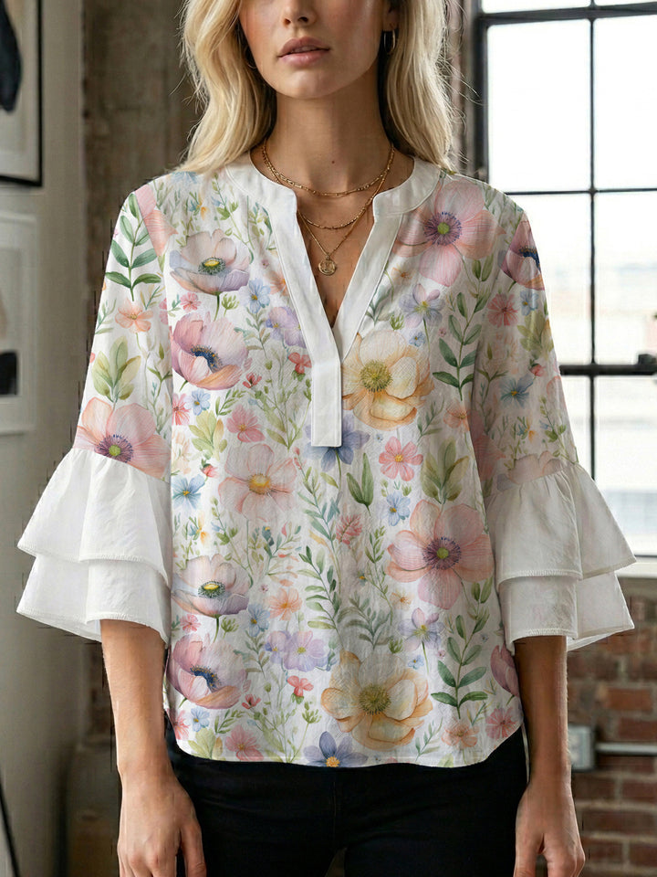 Damen elegantes Oberteil mit voluminösen Rüschensäumen und floralem Design Echo Archiv