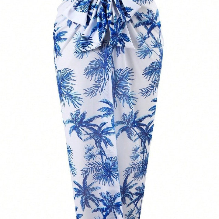 Damen Einteiler mit floralem Palmendruck und elegantem Überrock Echo Archiv