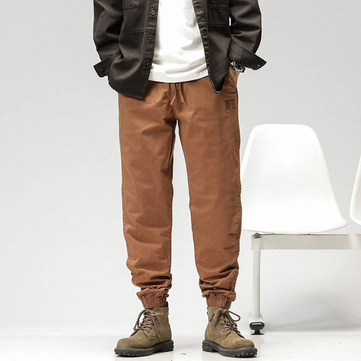 Herren Konisch geschnittene Utility-Joggerhose aus Baumwoll-Twill mit elastischem Bund und Kordelzug Echo Archiv