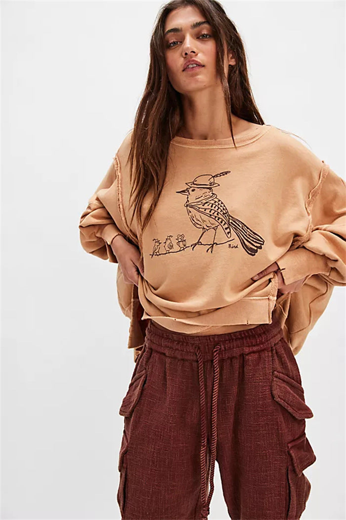 Damen oversized Sweatshirt mit Rüben-Print, ausgefransten Nahtakzenten und Daumenlochärmeln – Avérine