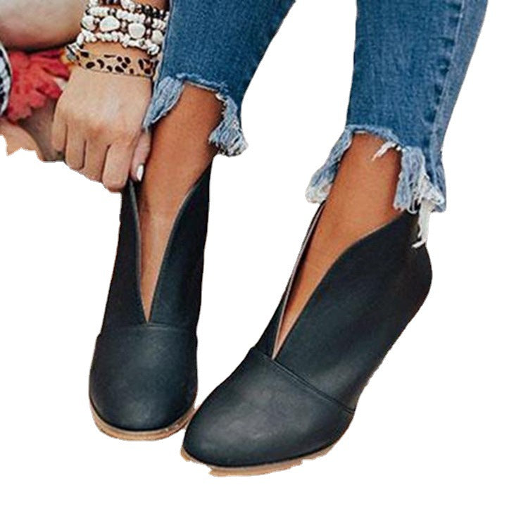 Damen nan knöchelhohe V-Cut Stiefelette mit gestapeltem Blockabsatz und spitz zulaufender Vorderkappe Echo Archiv