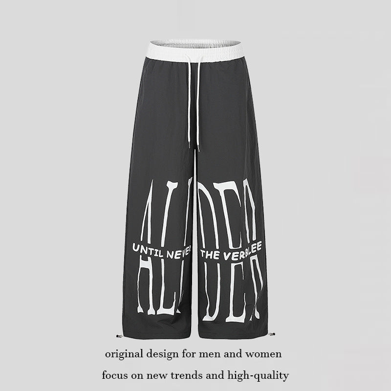 Damen Weite Loungewear-Hose mit hohem Komfortbund, Kordelzug, verstellbarem Saum und typografischem Print Echoarchiv