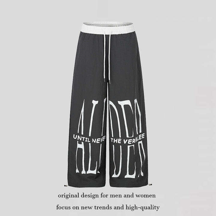 Damen Weite Loungewear-Hose mit hohem Komfortbund, Kordelzug, verstellbarem Saum und typografischem Print Echoarchiv