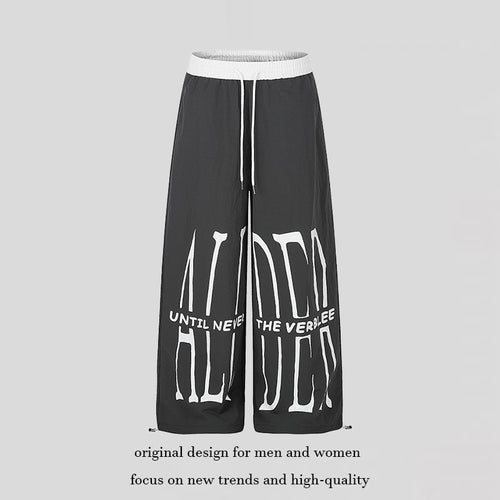 Damen Weite Loungewear-Hose mit hohem Komfortbund, Kordelzug, verstellbarem Saum und typografischem Print Echoarchiv