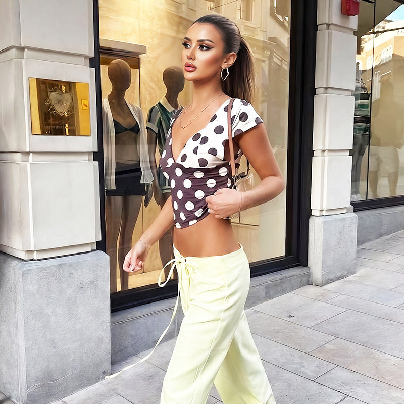 Damen Modisches Polka-Dots Oberteil mit tiefem V-Ausschnitt Echo Archiv