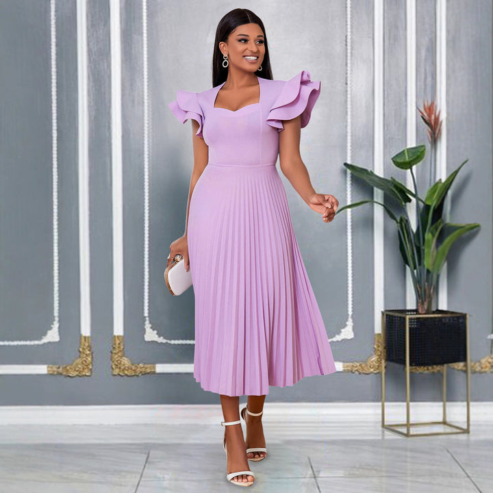 Damen plissiertes Maxikleid mit eleganten Rüschendetails Echo Archiv