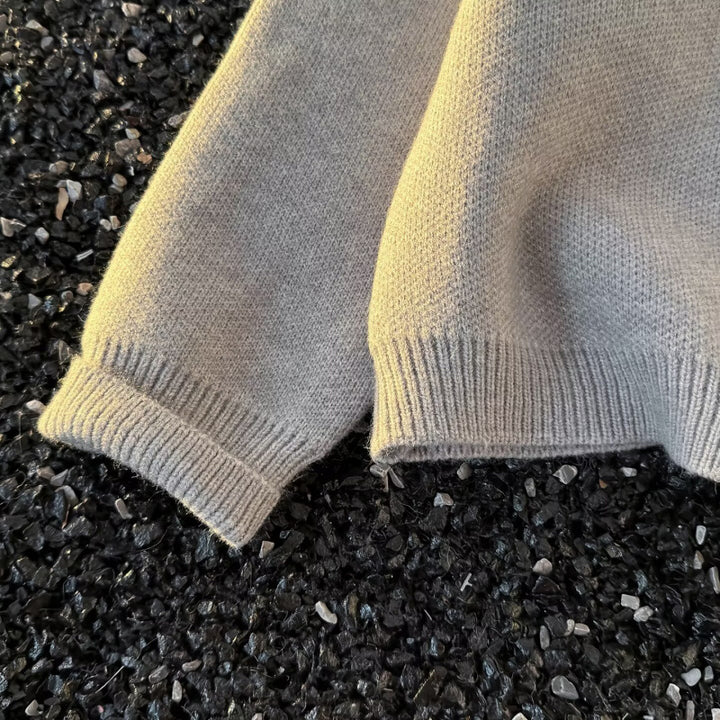 Unisex Kuscheliger melierter Feinstrick-Pullover mit Raglanärmeln und geripptem Rundhals Echoarchiv