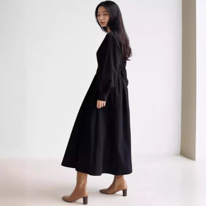 Damen Maxikleid mit Taillenabnähern, Rundhalsausschnitt und voluminösen Manschetten Echoarchiv