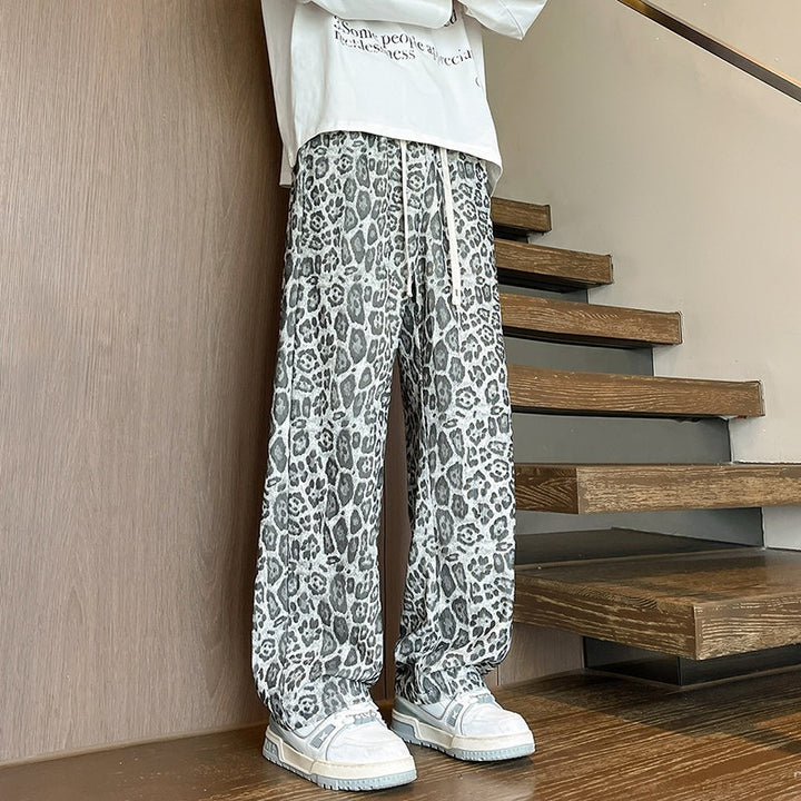 Herren Weit geschnittene Leoprint-Hose aus leichtem Viskose-Mix mit Kordelzug Echo Archiv