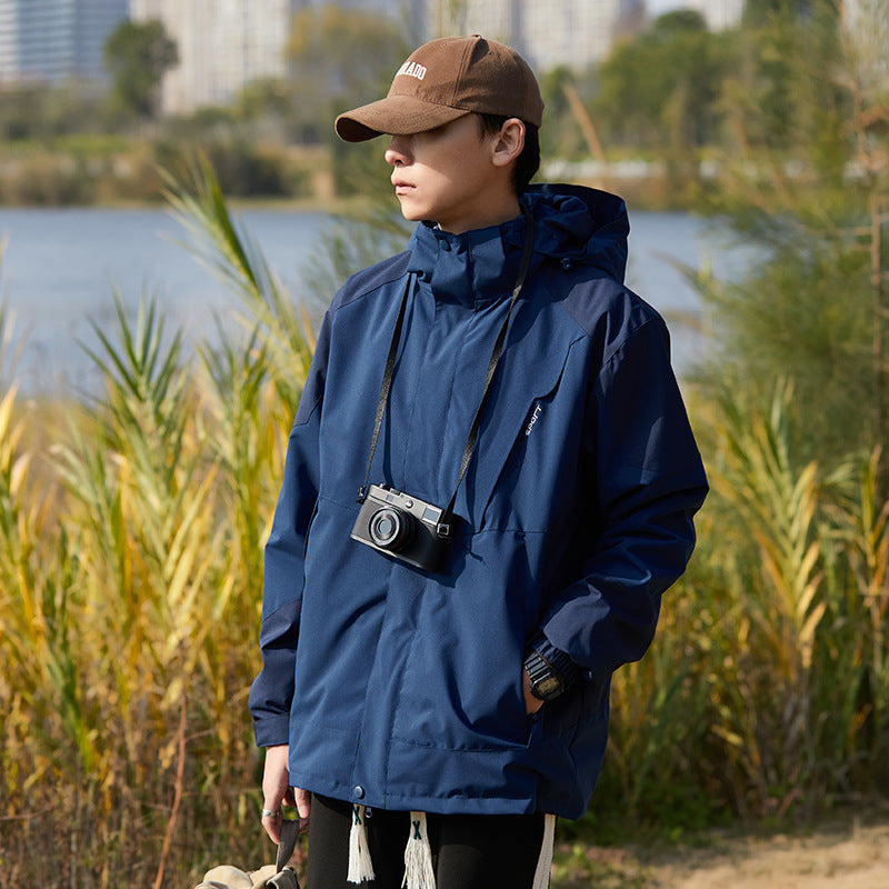 Damen zweilagige wasserabweisende Outdoorjacke mit Kapuze, Taillenregulierung und Kontrastbesätzen Echoarchiv