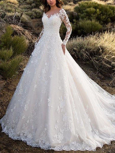 Elegantes Damen Hochzeitskleid mit Spitzenverarbeitung & voluminösem Rock für Hochzeit | Echoarchiv