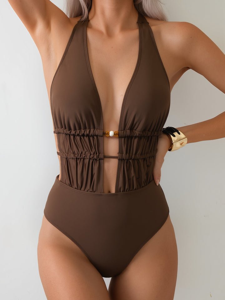 Damen Eleganter Monokini mit tiefem V-Ausschnitt und raffinierten Details Echo Archiv