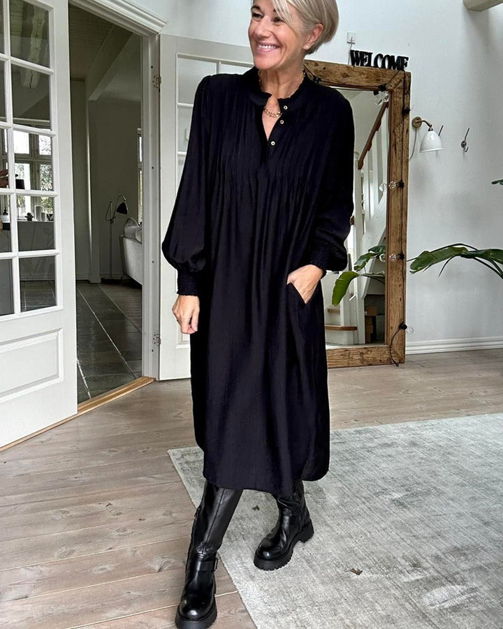 Damen nan lockeres Midikleid mit feiner Plissee-Optik, Stehkragen, kurzer Knopfleiste, gesmokten Manschetten und Eingrifftaschen Echo Archiv