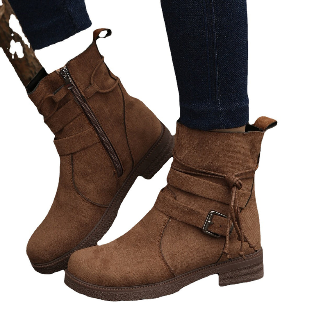Damen nan Kurzstiefelette aus Veloursoptik mit seitlichem Reißverschluss, dekorativem Wickelriemen und robust profilierter Sohle Echo Archiv
