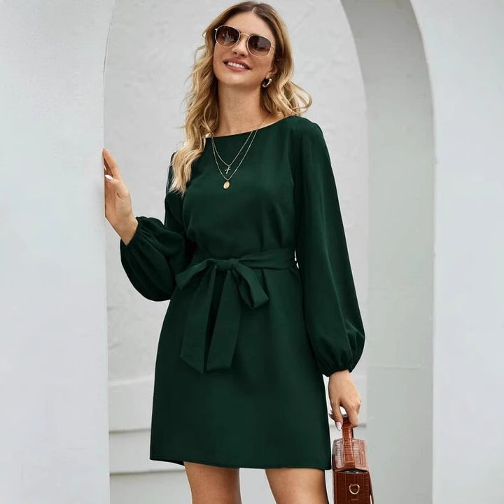 Damen nan elegantes Etuikleid mit Ballonärmeln und Taillengürtel Echo Archiv