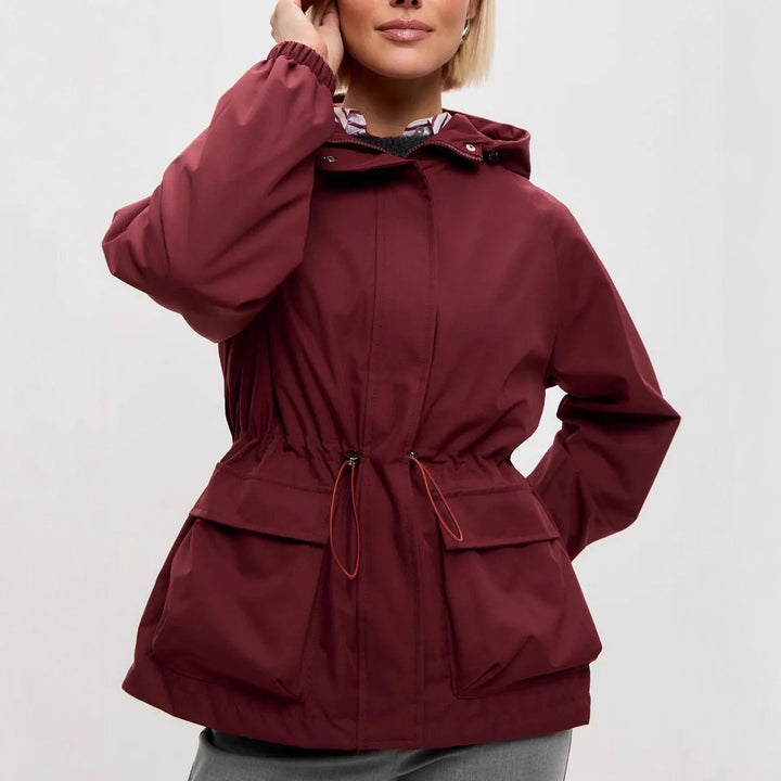 Damen wasserdichte Parka-Jacke mit Kapuze, Tunnelzugtaillierung und XXL-Klappentaschen – Célinea