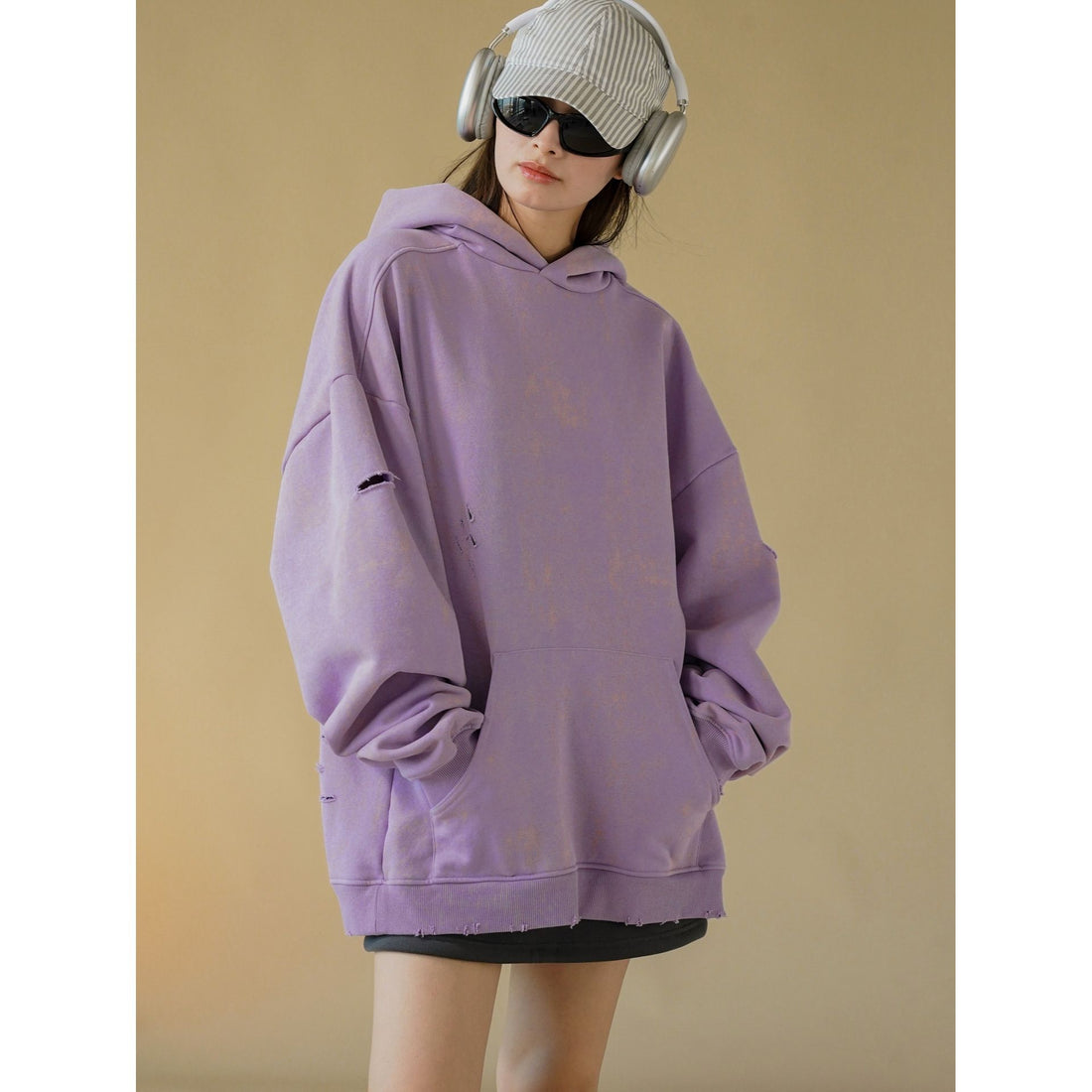 Damen Oversized-Hoodie mit Used-Optik und Riss-Details Echoarchiv