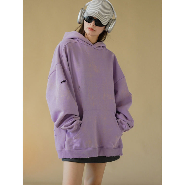 Damen Oversized-Hoodie mit Used-Optik und Riss-Details Echoarchiv