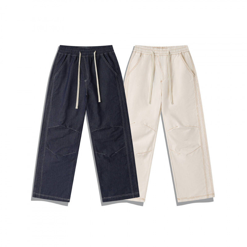 Unisex Weite Denim-Hose mit elastischem Bund, Kordelzug und gesteppter Kniepasse Echo Archiv