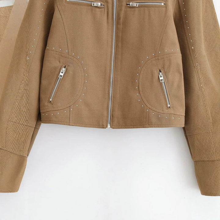 Damen Kurze Bikerjacke aus Wildlederimitat mit Nietenbesatz und Stehkragen Echo Archiv