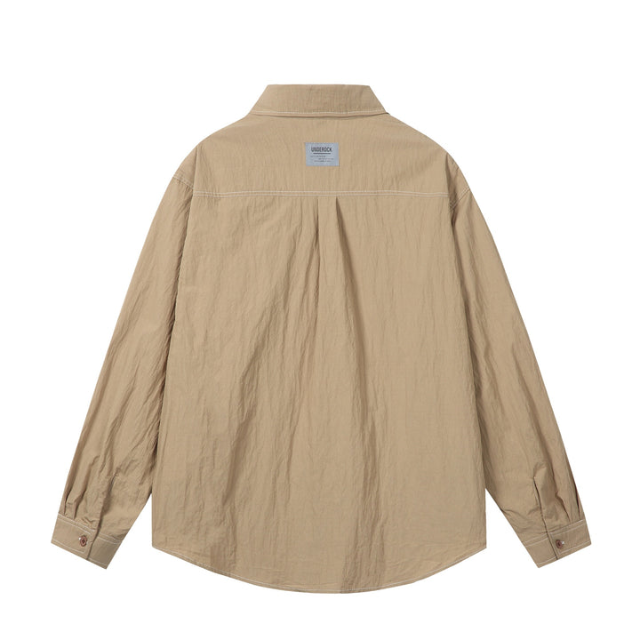 Unisex Oversize-Hemdjacke mit markanten Kontrastnähten und aufgesetzten Brusttaschen Echoarchiv