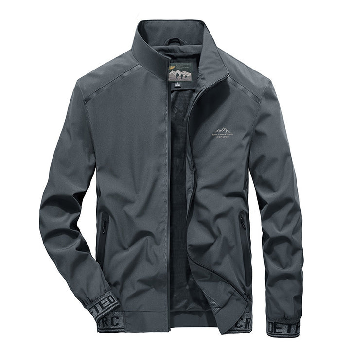 Herren Softshelljacke mit reflektierenden Einsätzen, wasserabweisenden Reißverschlusstaschen und hohem Stehkragen Echo Archiv