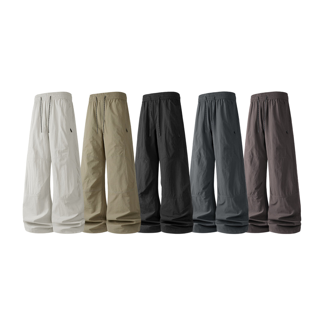 Herren Weite Baggy‑Hose mit Tunnelzugbund und Paneel‑Konstruktion Echo Archiv
