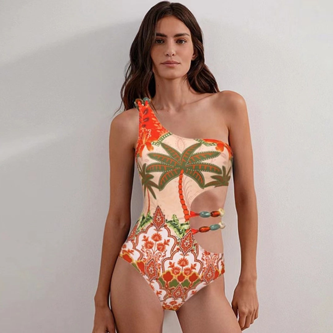 Damen Einteiler Badeanzug mit modischem Cut-Out und passendem Strandrock Echo Archiv