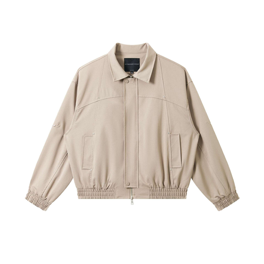 Unisex Kurz geschnittene technische Blousonjacke mit verdeckter Frontblende und elastischem Saum Echoarchiv