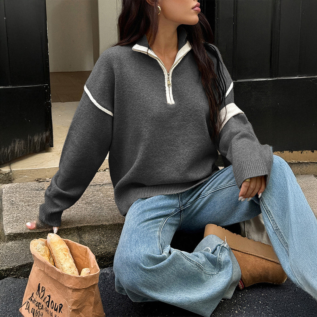 Damen oversized Strickpullover mit halbem Reißverschluss, Kontrastpaspeln und überschnittener Schulter – Mavelle