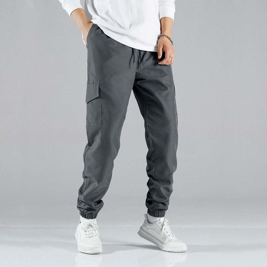 Herren Technische Cargo-Jogginghose im Utility‑Stil mit Klappentaschen & elastischen Knöchelbündchen Echo Archiv