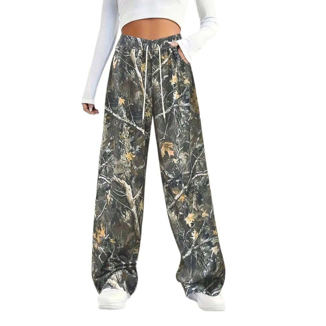 Damen Weite Palazzo-Loungehose im Camouflage-Blattmuster mit Elastikbund, Tunnelzug und Eingrifftaschen Echoarchiv