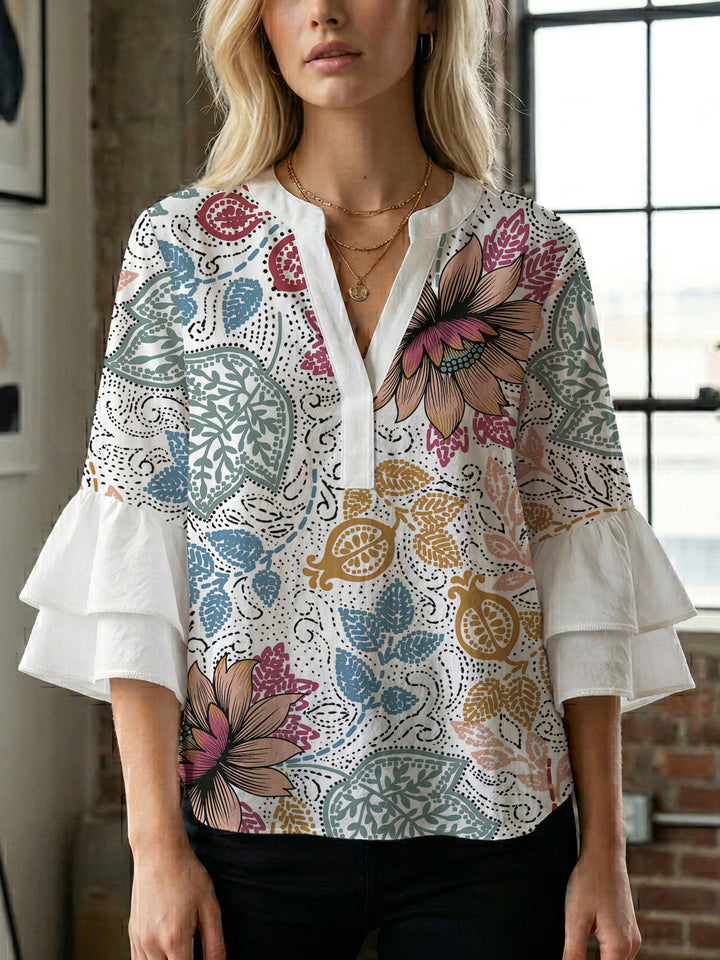 Damen Bluse mit voluminösen Rüschenärmeln und kreativem Floraldesign Echo Archiv