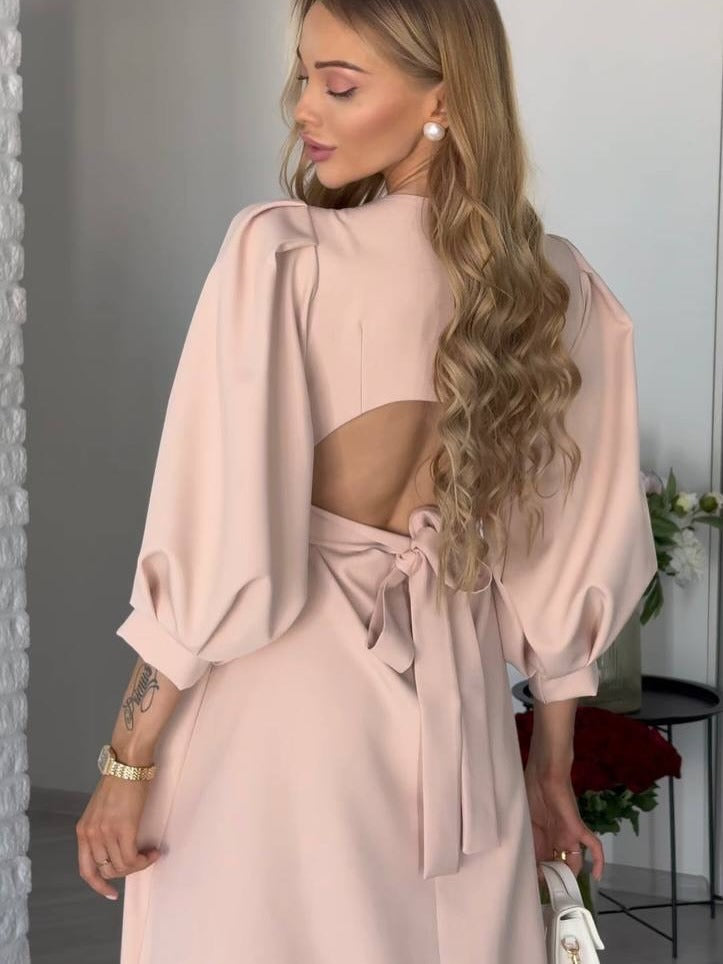 Damen Midikleid mit offenem Rückenausschnitt, voluminösen Puffärmeln und Bindegürtel Echoarchiv