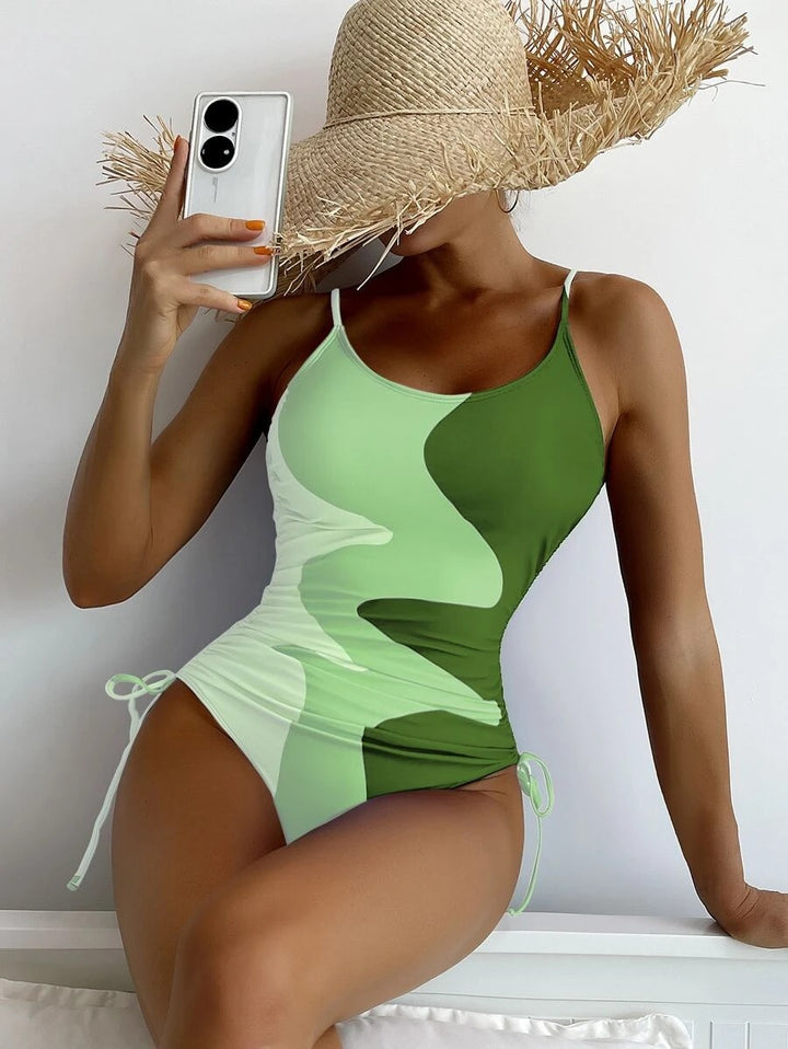 Damen Einteiler-Badeanzug mit verspielten Cut-Outs und floralem Design Echo Archiv